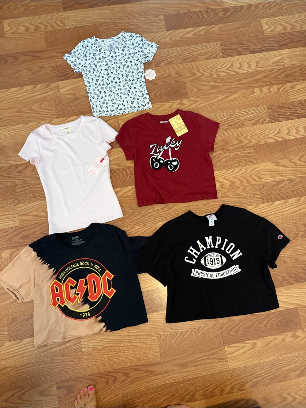 5 women shirts all size medium. A few brand new with tags and other ones almost